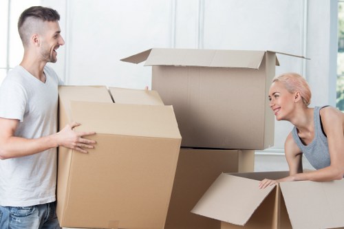 Happy client completing a successful move with a Bayswater moving truck