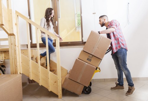 Man with a van ensuring safe packing of belongings
