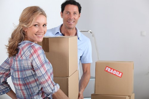 Professional packers preparing belongings with care